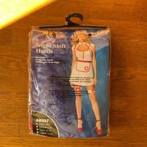 Spirit Halloween COMPLETE Nurse costume. Never opened!